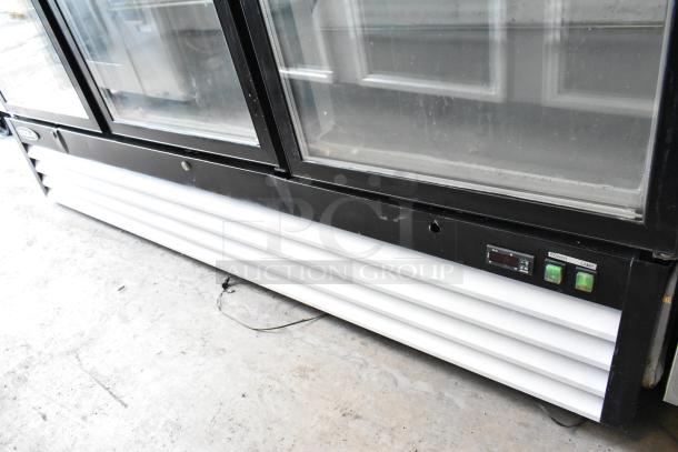 Kool-It KGF-72 metal commercial 3-door reach-in cooler with poly coated racks, 115 Volts, 1 Phase, shown with control panel.