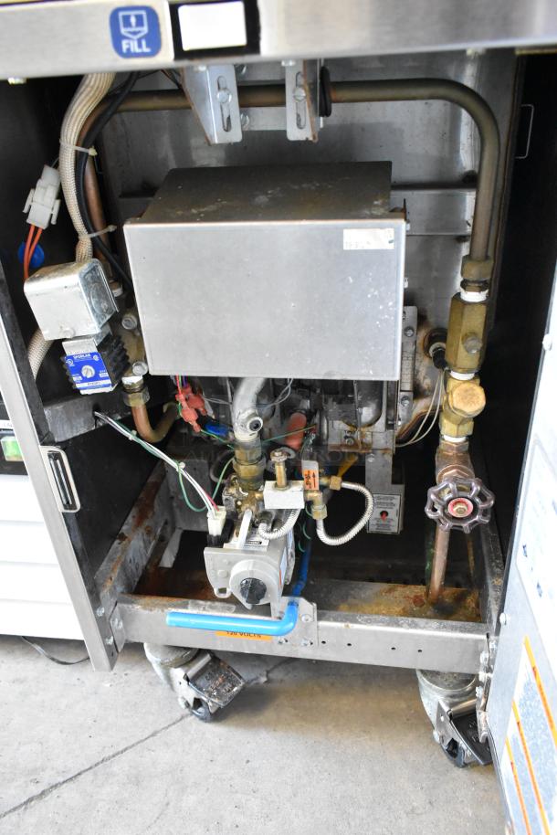 2019 Pitco Frialator SRTG stainless steel natural gas rethermalizer, 55,000 BTU, on casters. Interior view showing components.