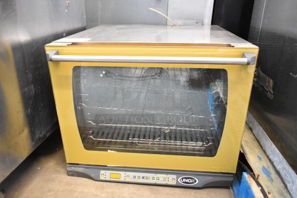 Cadco Unox stainless steel commercial convection oven, electric, 208/240V, countertop model, visible control panel, used.