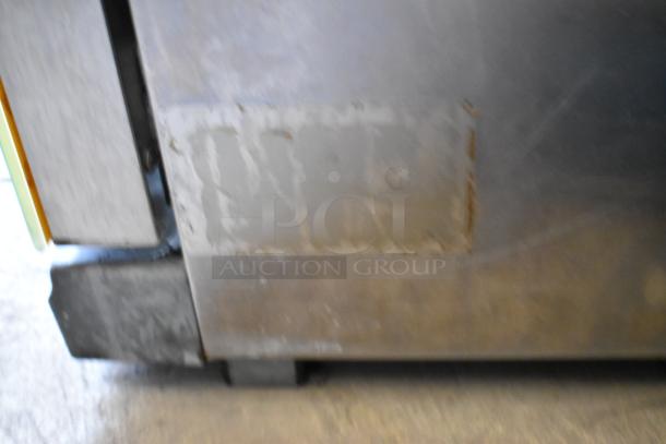 Cadco Unox stainless steel commercial countertop convection oven. Electric-powered, 208/240 volts. Used condition.
