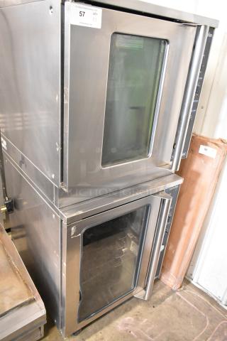 Two Moffat E89AMS Turbofan 32 stainless steel convection ovens with view-through doors, metal racks, and thermostatic controls.