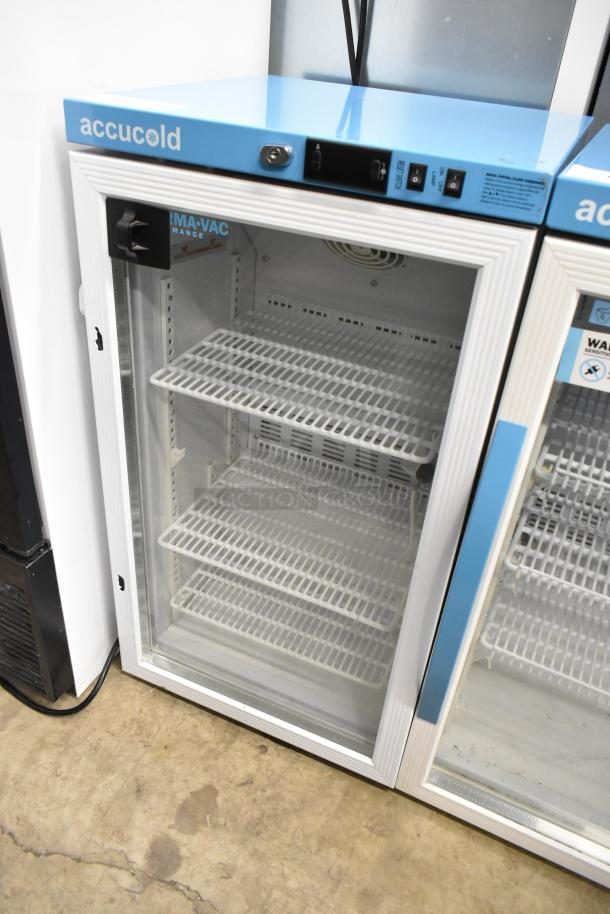2019 Accucold ARG3PV metal mini cooler merchandiser with glass door, white shelves, good condition, 115 volts, 1 phase.