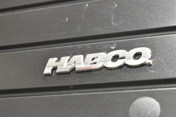 2019 Habco SE18 metal commercial single door reach-in cooler merchandiser, features poly coated racks, visible Habco logo.
