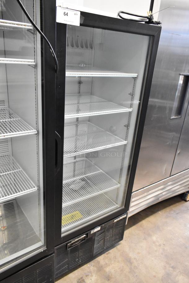 Habco SE12 commercial single door cooler with poly coated racks, 115 volts, 1 phase. Metal frame, clear glass door, good condition.
