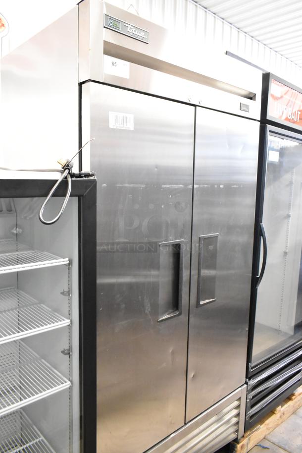 2025 True T-35-HC stainless steel 2-door commercial cooler with poly-coated racks, 115V, 1 phase, in good condition.