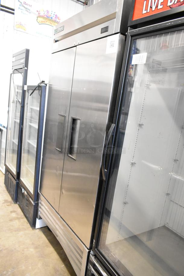 2025 True T-35-HC stainless steel 2-door reach-in cooler, poly-coated racks, 115V, 1-phase, excellent condition.