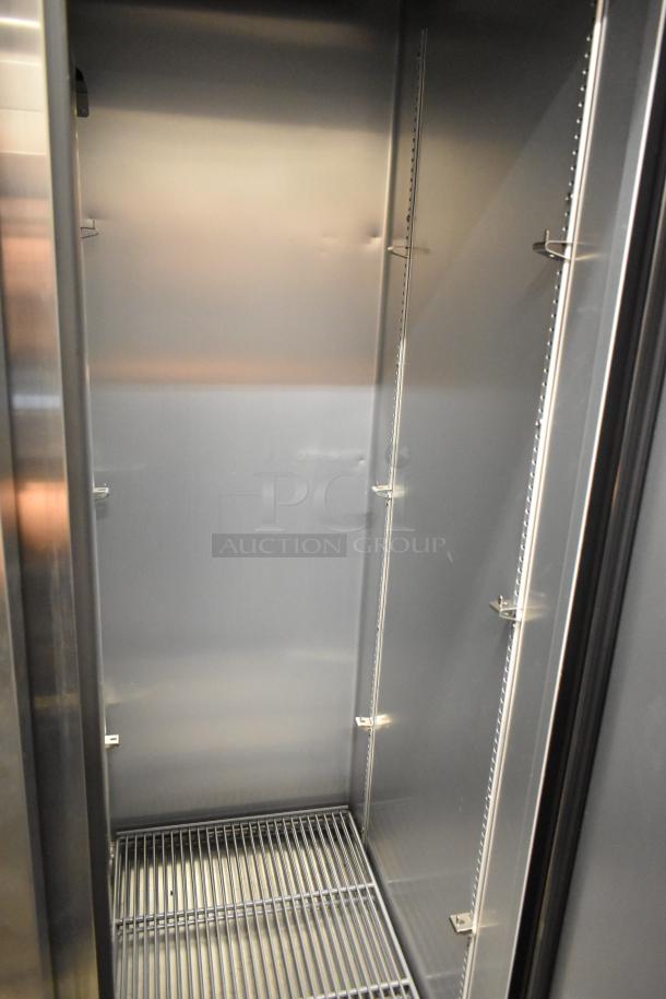 2025 True T-35-HC stainless steel commercial cooler interior, featuring poly-coated racks. 115 volts, 1 phase. Clean condition.
