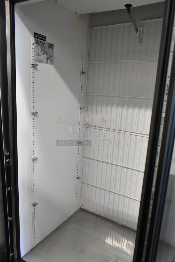 2017 True GDM-26F-HC metal single door cooler with poly coated racks, 115 volts, 1 phase. Clean interior, visible model label.