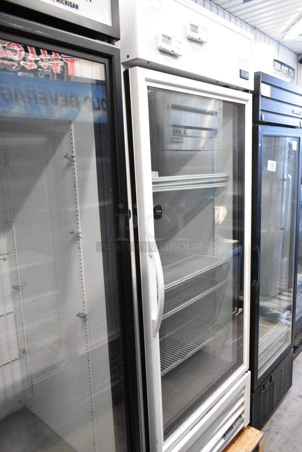 2021 True TSCI-600R-G-PH single door reach-in cooler with poly-coated racks, 115V, excellent condition.
