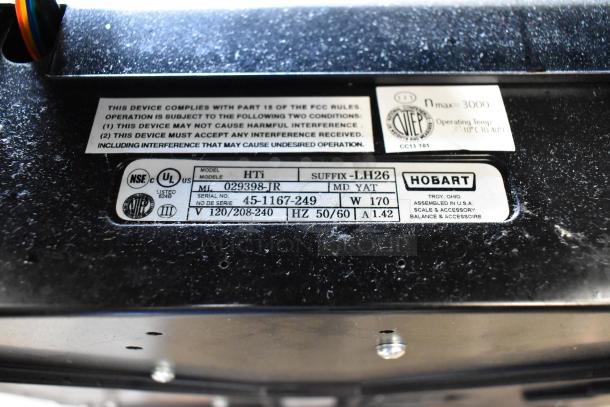 2017 Hobart HTi metal commercial scale, model HTi, missing weight plate. 120/208-240V, 1 phase. Label shows serial and model info.