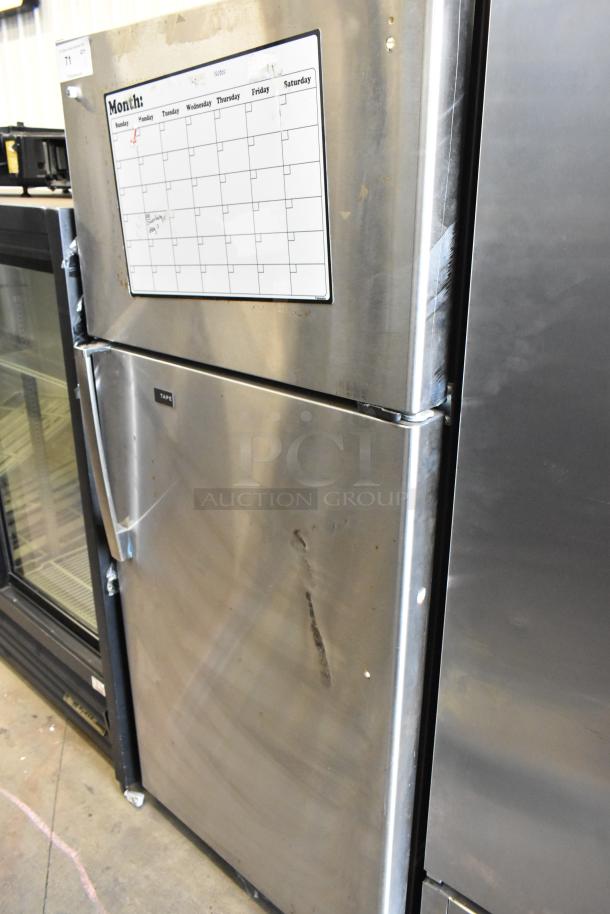General Electric GE GTS17GSNDRSS stainless steel cooler with freezer, top door calendar, visible scratches. 115V, 1 Phase.
