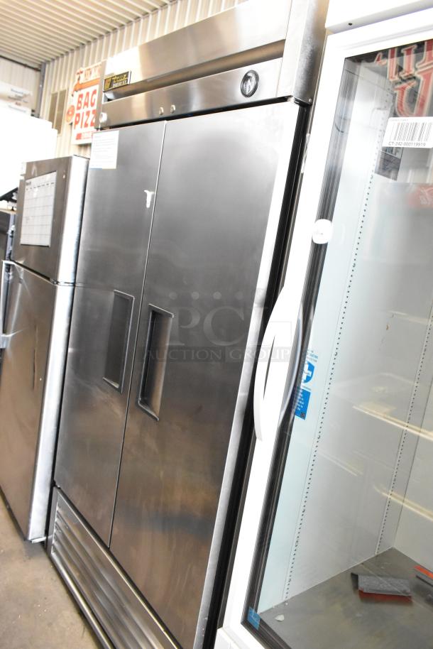 2016 True T-35 stainless steel 2-door commercial cooler with poly coated racks, 115 volts, 1 phase, excellent condition.