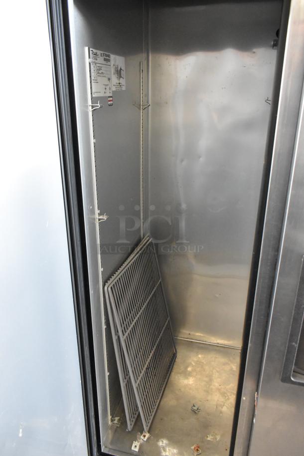 2016 True T-35 stainless steel 2-door reach-in cooler, poly-coated racks, 115V, 1 phase, interior view with label.