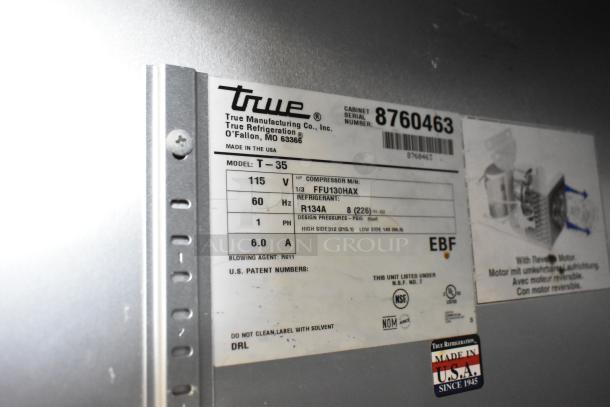2016 True T-35 Stainless Steel 2-Door Cooler with poly-coated racks, 115V, 1 phase; includes specifications label.