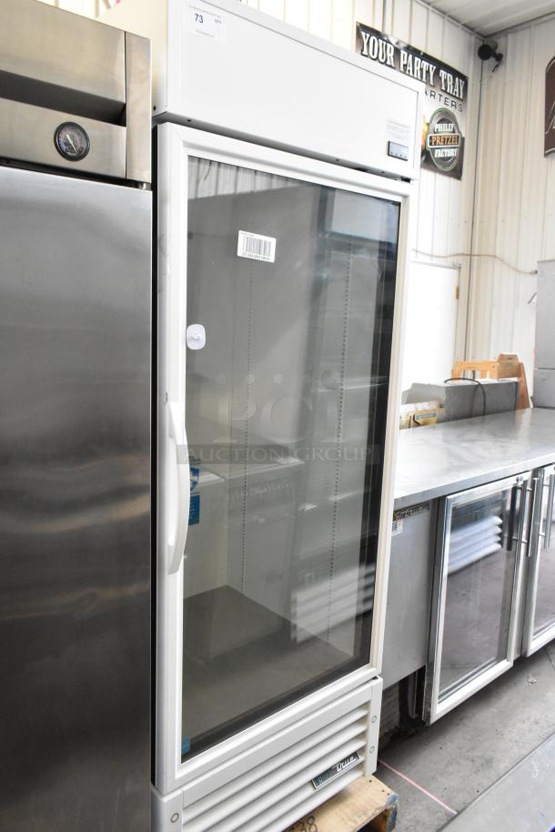 2021 True TSCI-600R-G-PH metal single door reach-in cooler with poly-coated racks, 115V, 1 phase; glass front.