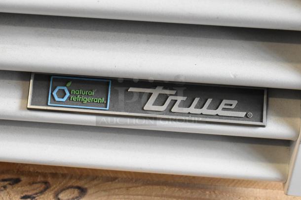 2021 True TSCI-600R-G-PH Single Door Cooler, metal, poly-coated racks, 115V, 1 phase, with natural refrigerant label.