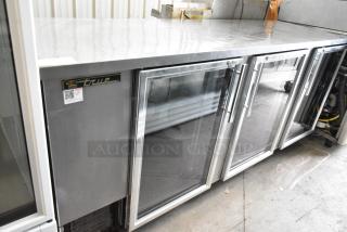 True TBB-4G-S-LD Stainless Steel Commercial 3 Door Back Bar Cooler Merchandiser on Commercial Casters. 115 Volts, 1 Phase. - Item #1205364