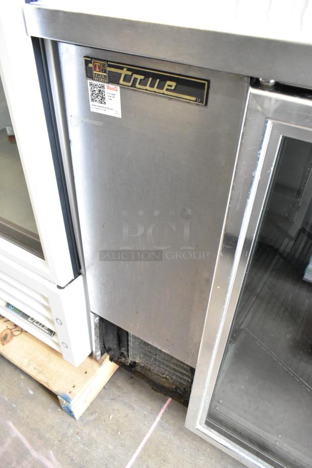 True TBB-4G-S-LD stainless steel 3-door back bar cooler on casters, 115V, 1 phase. True logo visible.