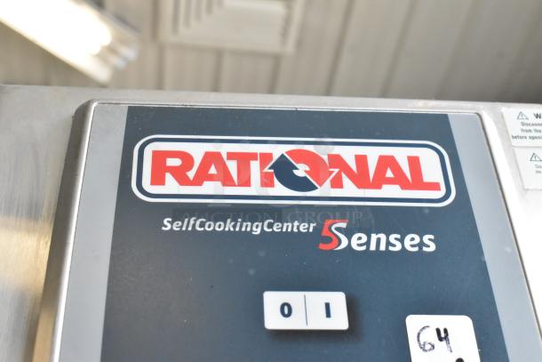 Rational SelfCookingCenter 5Senses control panel, showcasing branding and model details in a stainless steel frame.