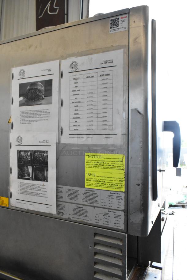 Rational SelfCookingCenter 5Senses iCombiPro convection oven, stainless steel, with instructions and notices attached.