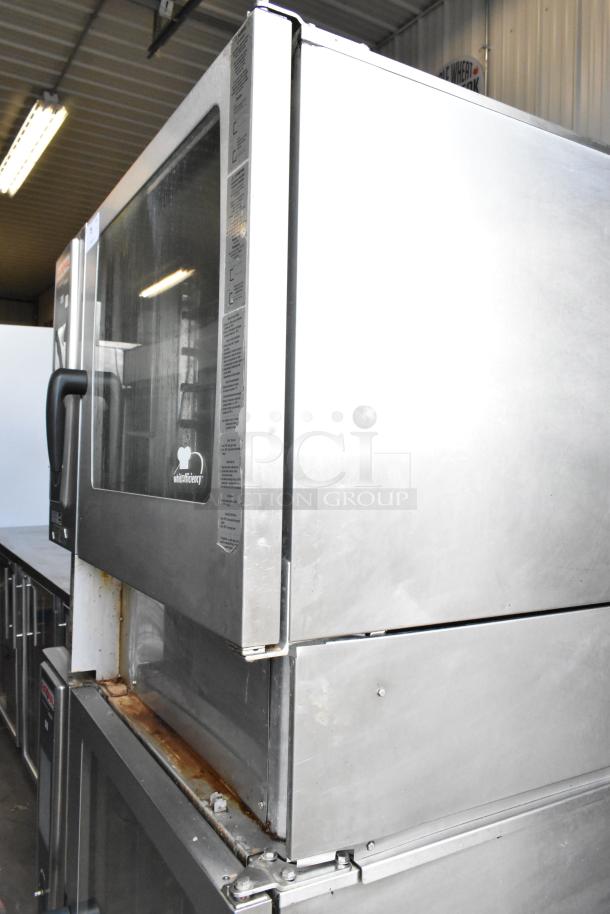 Two Rational SelfCookingCenter iCombiPro convection ovens, stainless steel, commercial-grade, visible wear, auction item.