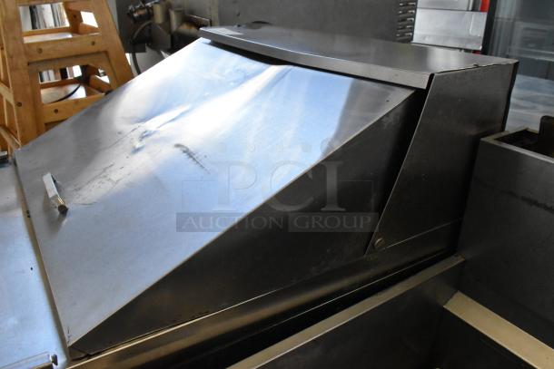 Atosa MGF8305GR stainless steel prep table with bain marie mega top, commercial casters, 115V, 1 Phase, visible dents.