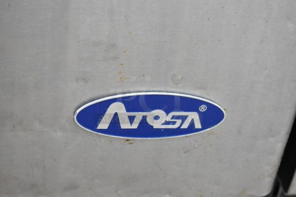 Atosa MGF8305GR stainless steel prep table, logo visible; commercial casters; 115 volts, 1 phase power; slight wear.