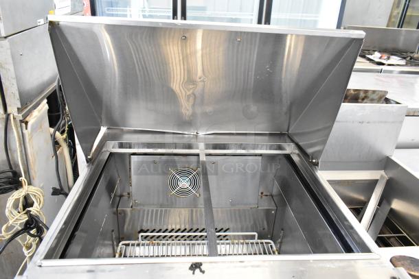 Atosa MGF8305GR stainless steel prep table with open lid, showing internal compartments, commercial casters, 115V, 1 phase.