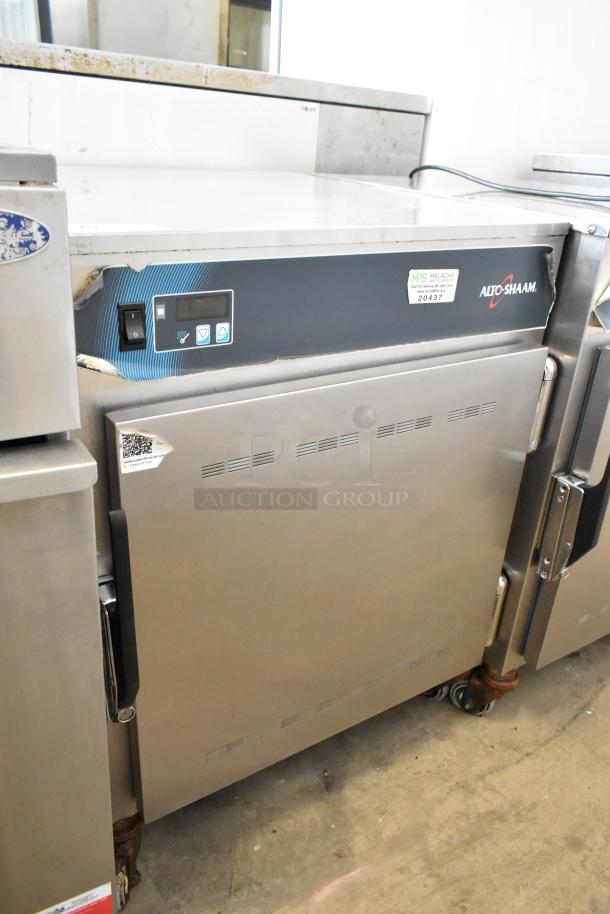 Alto Shaam 750-S stainless steel heated holding cabinet on casters, visible control panel, slightly worn exterior, 120V, 1 phase.