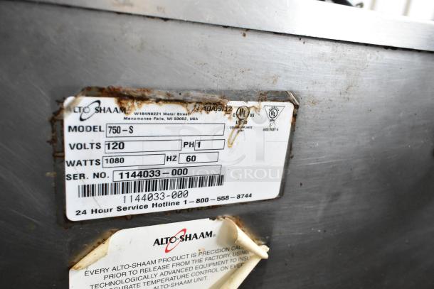 Alto Shaam 750-S stainless steel heated cabinet, 120V, 1 phase, with commercial casters. Model and voltage labels visible.