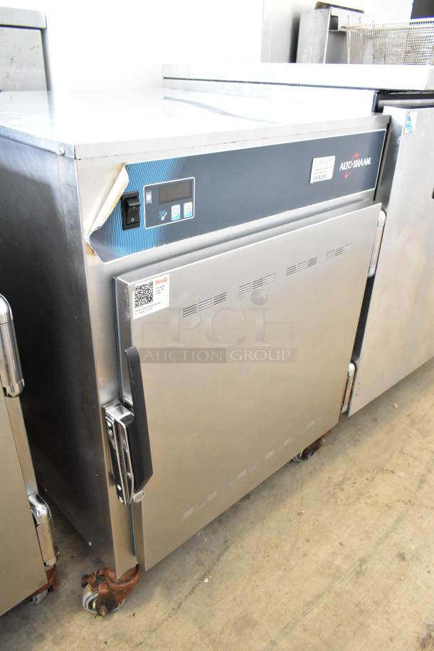 Alto Shaam 750-S stainless steel heated holding cabinet on casters, 120V, robust design, digital controls, visible labels.