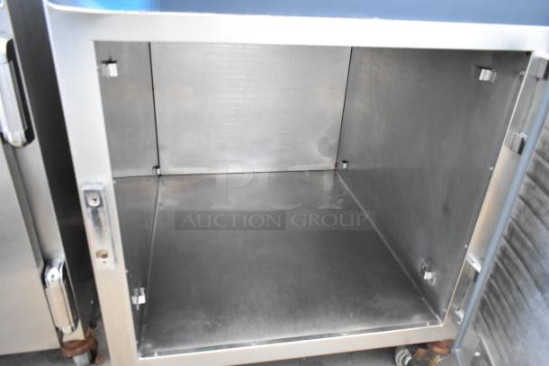 Alto Shaam 750-S stainless steel heated holding cabinet with casters, open interior view. 120V, 1 phase.