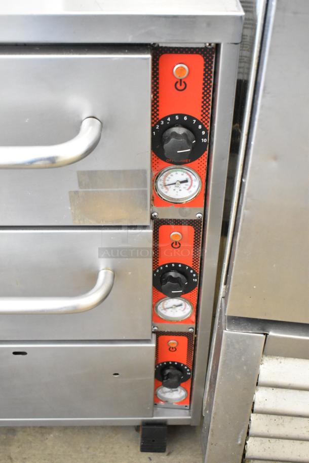 Vulcan stainless steel 3-drawer warming drawer on commercial casters, temperature controls visible, lightly used condition.