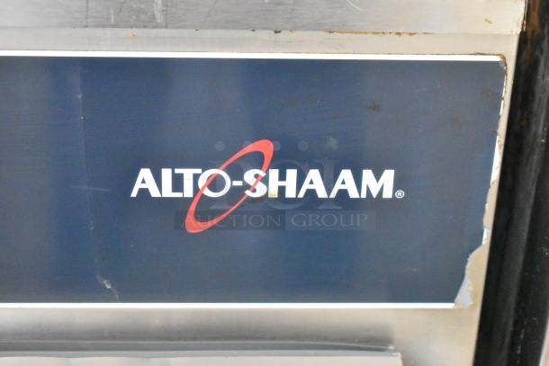 Alto Shaam 750-S stainless steel heated holding cabinet on commercial casters, 120 volts, 1 phase, branded panel visible.