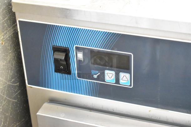 Alto Shaam 750-S stainless steel commercial heated holding cabinet with control panel, 120 volts, on commercial casters.
