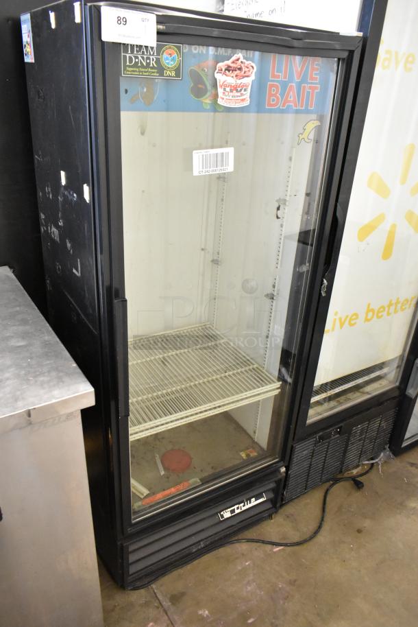 True GDM-12 single door reach-in cooler, glass front, metal frame, used condition, poly coated racks, 115V, 1 phase.