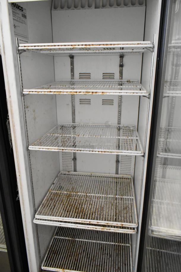 2019 Habco SE18 commercial cooler with metal single door, poly coated racks, visible wear, 115 volts, 1 phase.