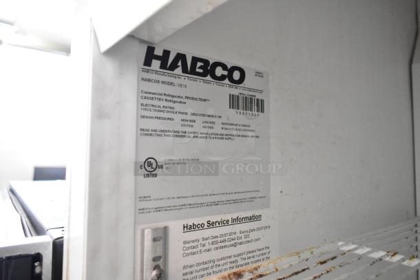 2019 Habco SE18 commercial single door cooler with poly coated racks, visible label details electrical rating and UL listing.