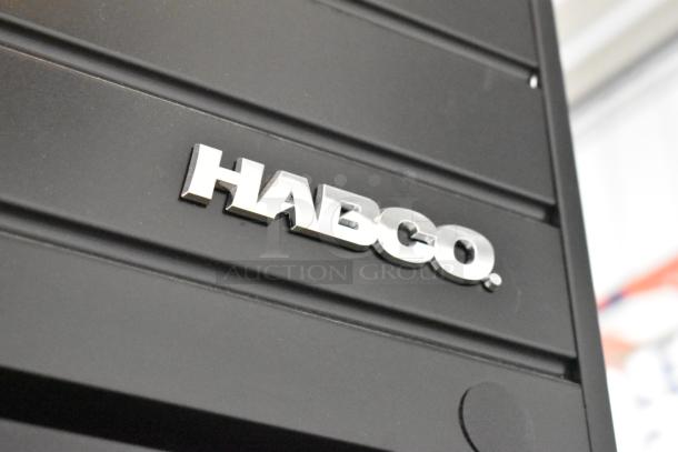 2019 Habco SE18 metal single door cooler, poly coated racks, 115V, 1 phase. Habco logo on front panel.