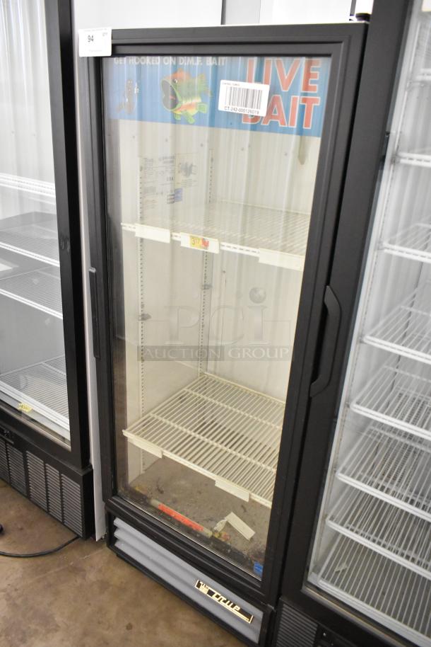 True GDM-12 commercial single door cooler merchandiser with poly-coated racks, used condition, 115V, 1 phase.