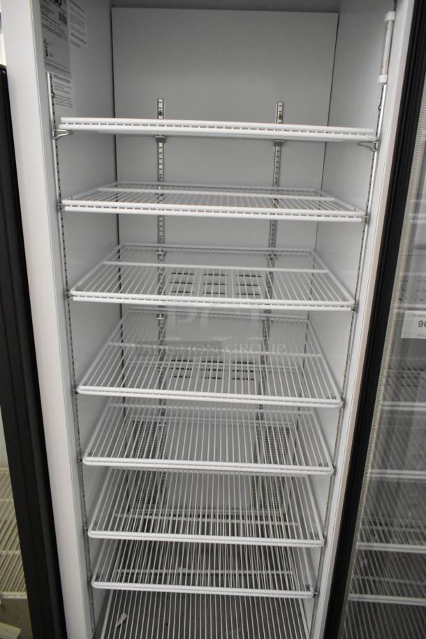 2019 Habco SE18 metal single door cooler merchandiser with poly-coated racks. 115 volts, 1 phase, excellent condition.