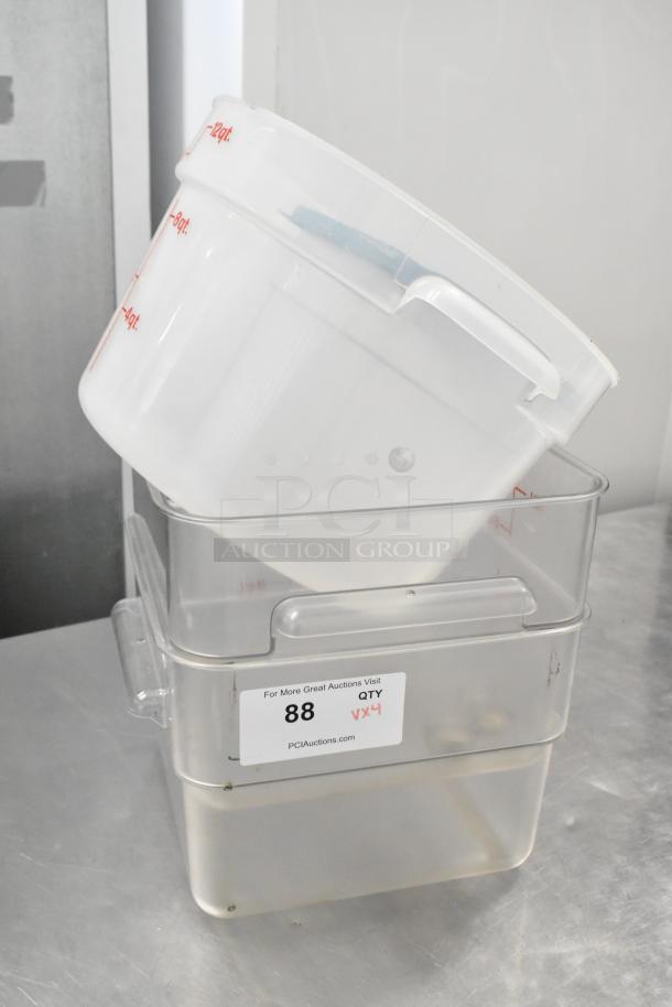 Lot of 4 clear poly bins with red quart markings. Auction tag indicating quantity and lot number visible. Good condition.