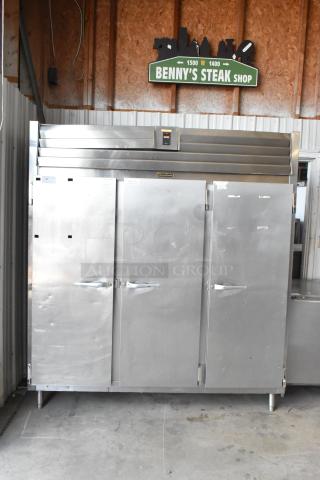 Traulsen RL332N-ZBY01 stainless steel 3-door commercial reach-in freezer with poly-coated racks, 115V, 1 phase, in good condition.