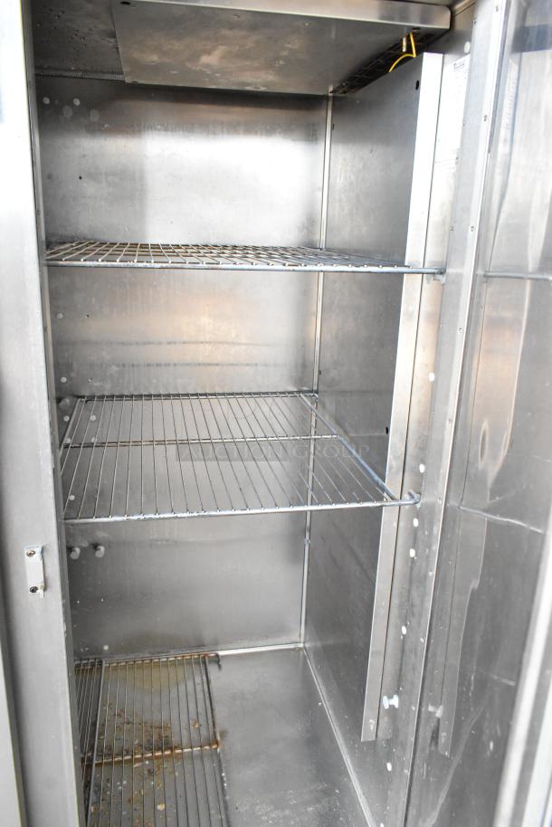Traulsen RL332N-ZBY01 stainless steel 3-door freezer, poly-coated racks, commercial-grade, 115 volts, 1 phase.