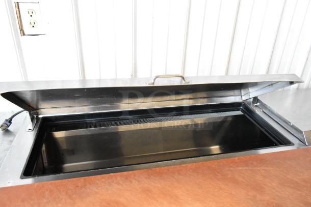 True TSSU-72-18-ST stainless steel pizza prep table with open top, on commercial casters. 115 volts, 1 phase.