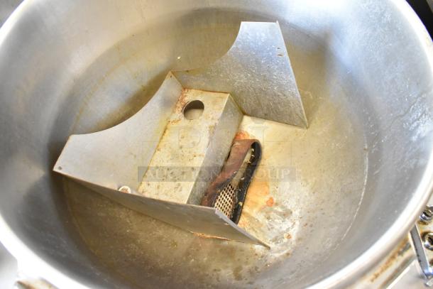 Market Forge MT40 stainless steel 40-gallon steam kettle, visible interior, used condition.