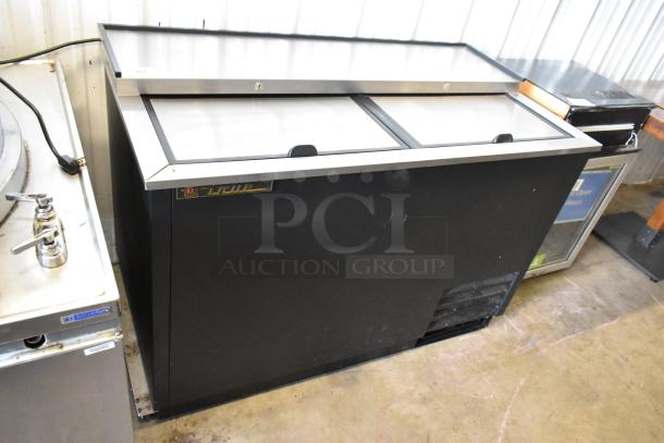 True TD-50-18 Stainless Steel Commercial Back Bar Cooler, 2 sliding lids, 115 volts, 1 phase, in good condition.