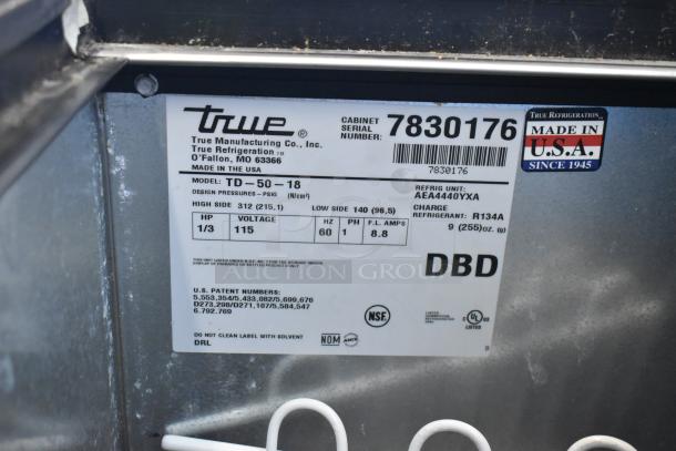 True TD-50-18 stainless steel bar cooler, model details tag, 115 volts, 1 phase, NSF certified, made in USA.