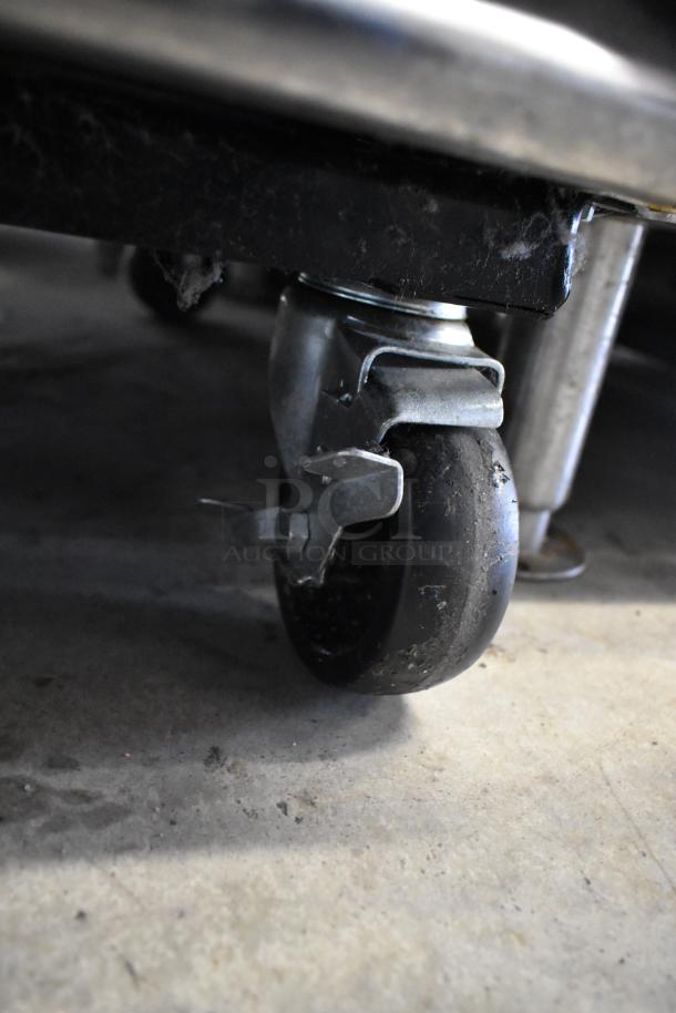 True T-23F freezer caster, showing sturdy wheel and metal bracket, indicating mobility and industrial quality.