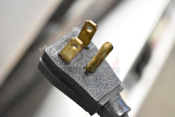 Power plug of True T-23F commercial freezer, indicating it's a 115 Volts, 1 Phase unit.